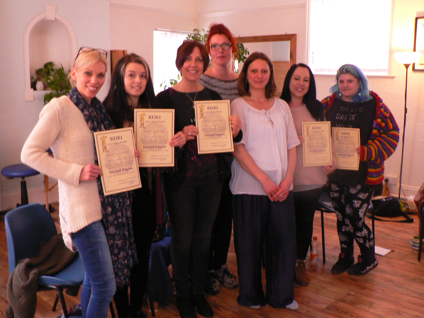Students with their certificates